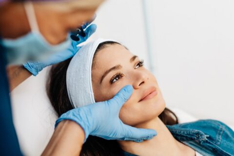 Professional Performing a Skincare Procedure at Oceanshore Aesthetics & Wellness