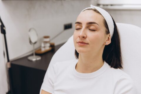 Client Resting on Treatment Bed at Oceanshore Aesthetics & Wellness