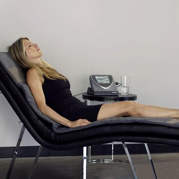 Patient Receiving BEMER Therapy at Oceanshore Aesthetics and Wellness